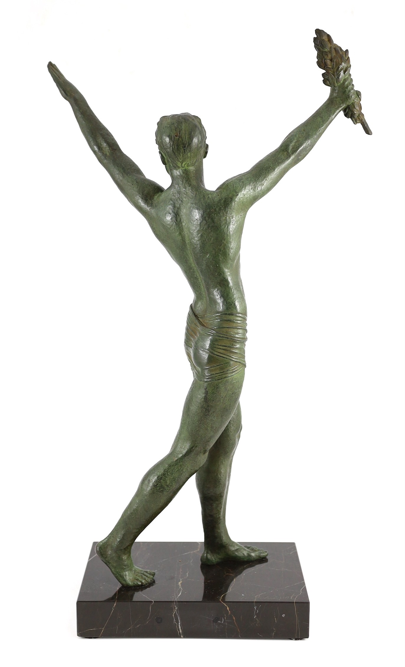 J. Darcourt. NB. An Art Deco patinated spelter figure of a victorious athlete, depth 15cm height 63cm